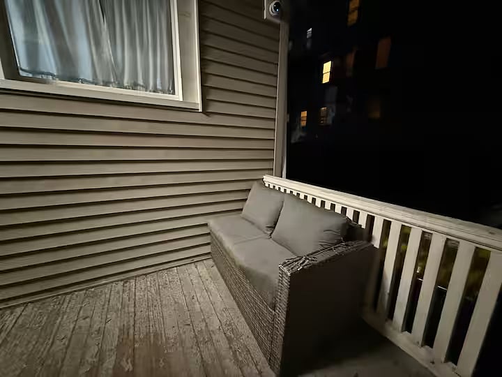 Front porch with bench.