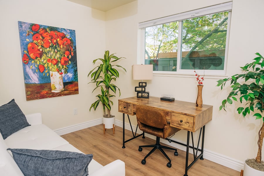 Second bedroom/office with office desk and charging station
