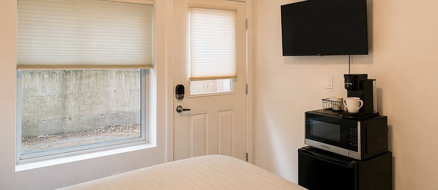 Enjoy the convenience of a mini fridge, microwave, and Keurig coffee maker.