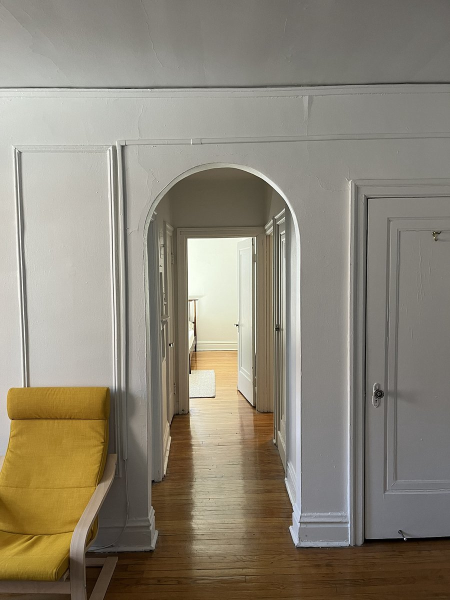 Hallway leading to bathroom, bedroom and kitchen