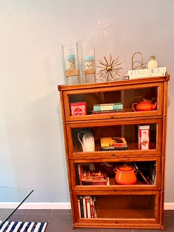 This cabinet is in the dininroom and features many cookbooks to guide you in your cooking adventures.