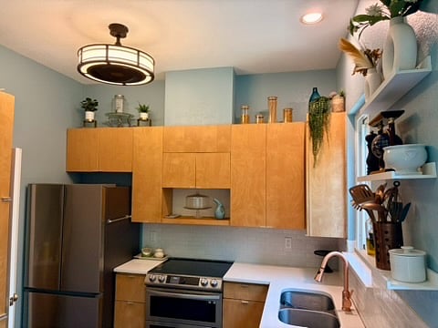 The kitchen is modern with all new appliances installed in 2023.
