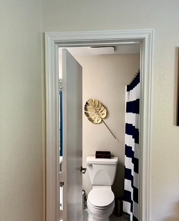 Looking into the bathroom from the second bedroom.
