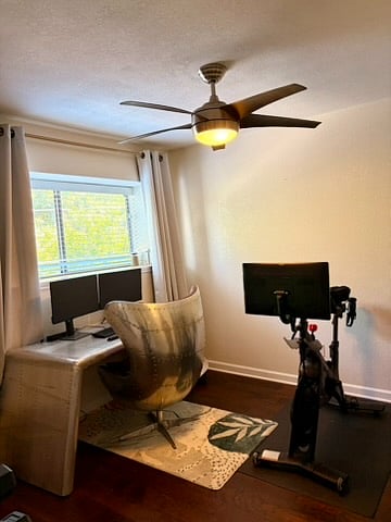 The second bedroom also features lots of light through its large windows.