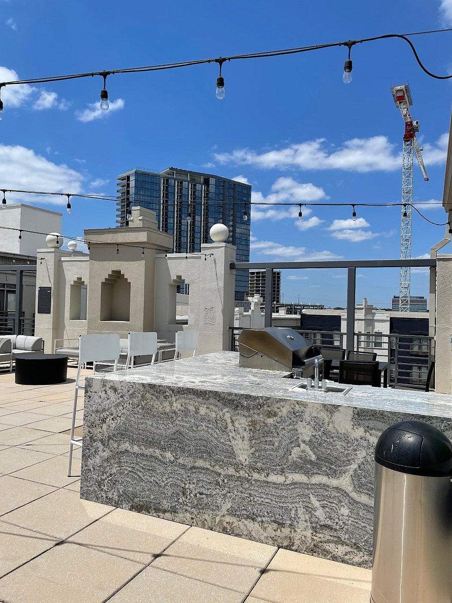 Sky Lounge with Rooftop Deck, Fireplace, & Outdoor Kitchen
