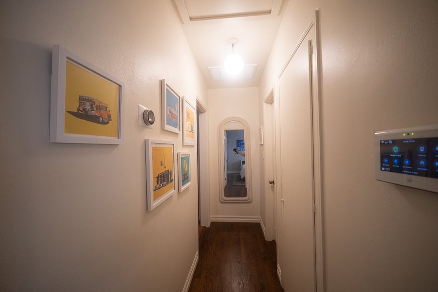 Full-length mirror in the hallway.