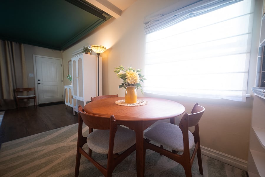 Dining room features original Danish Teak table (butterfly style - expanding) and chairs from the 1960s.