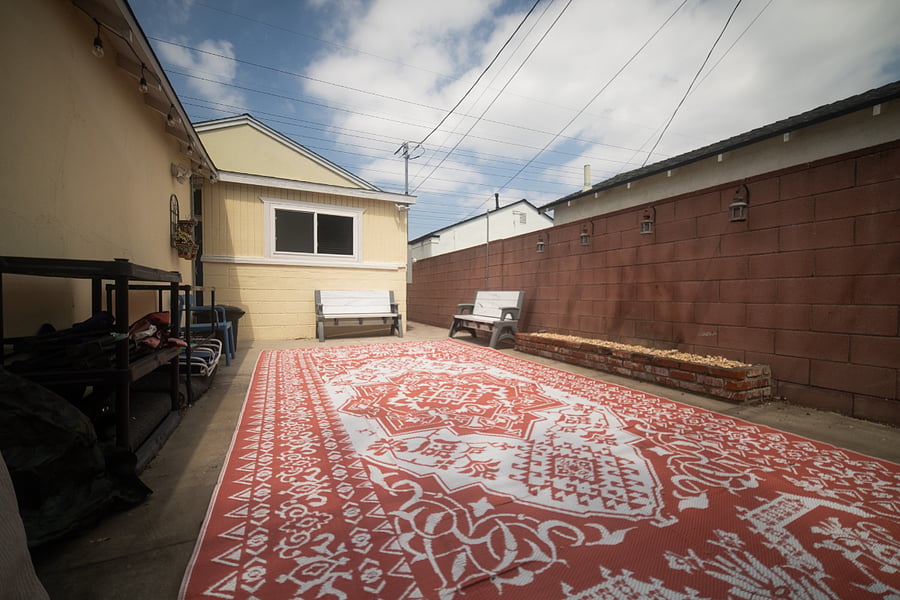Outdoor parking area at the back of the house