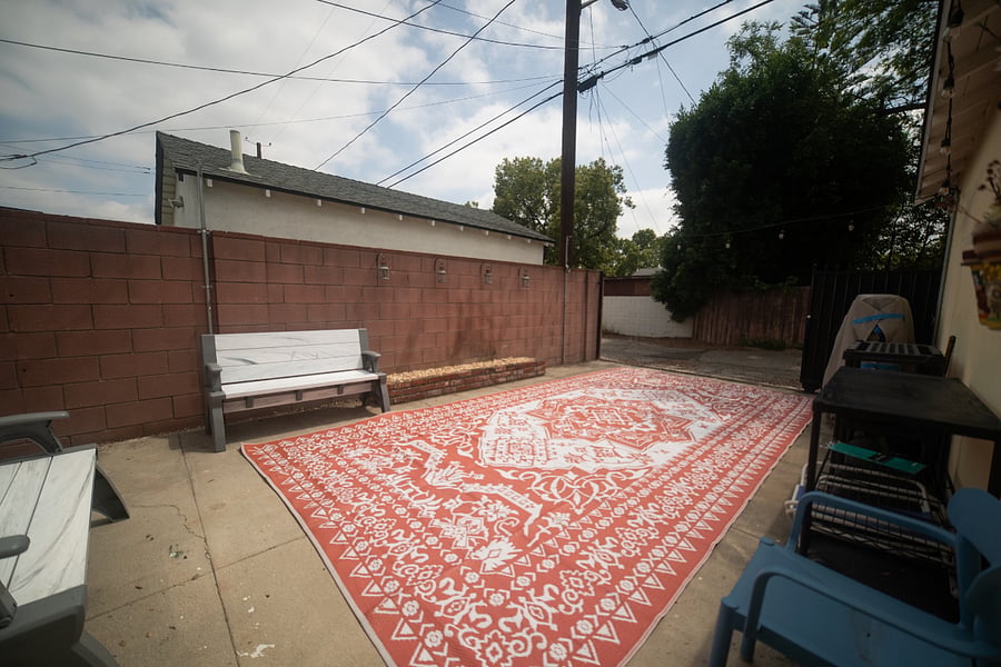 Outdoor parking area with gate open