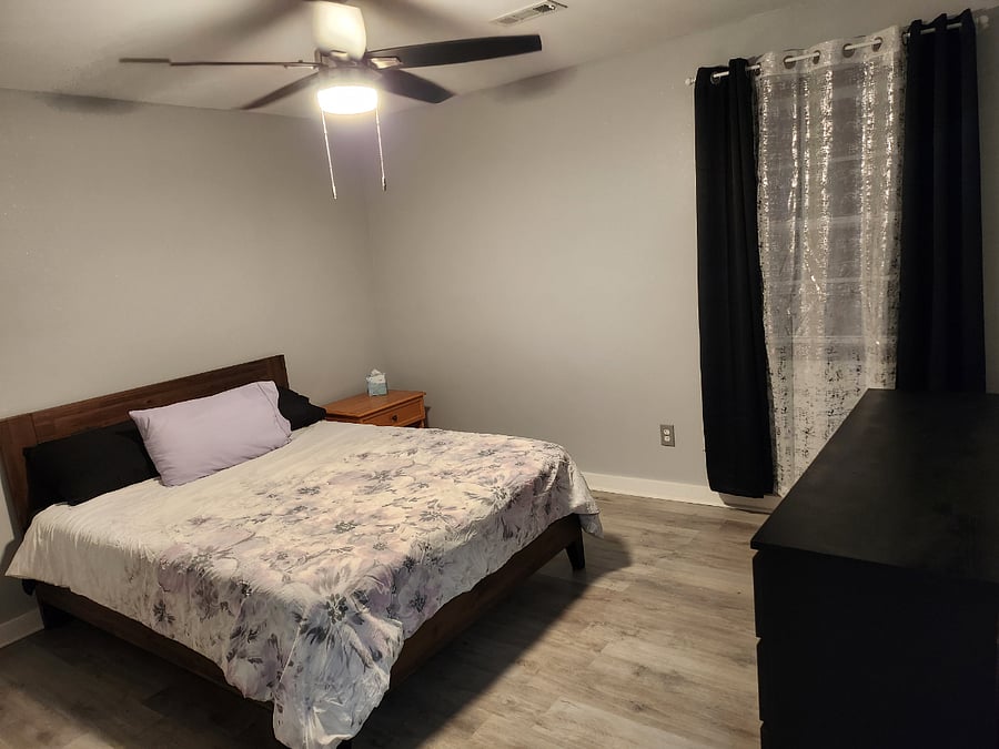 Soothing bedroom at the back of the house. Sleep undisturbed in the cool dark.