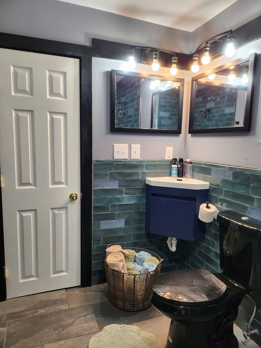 Double mirrors in wet room.