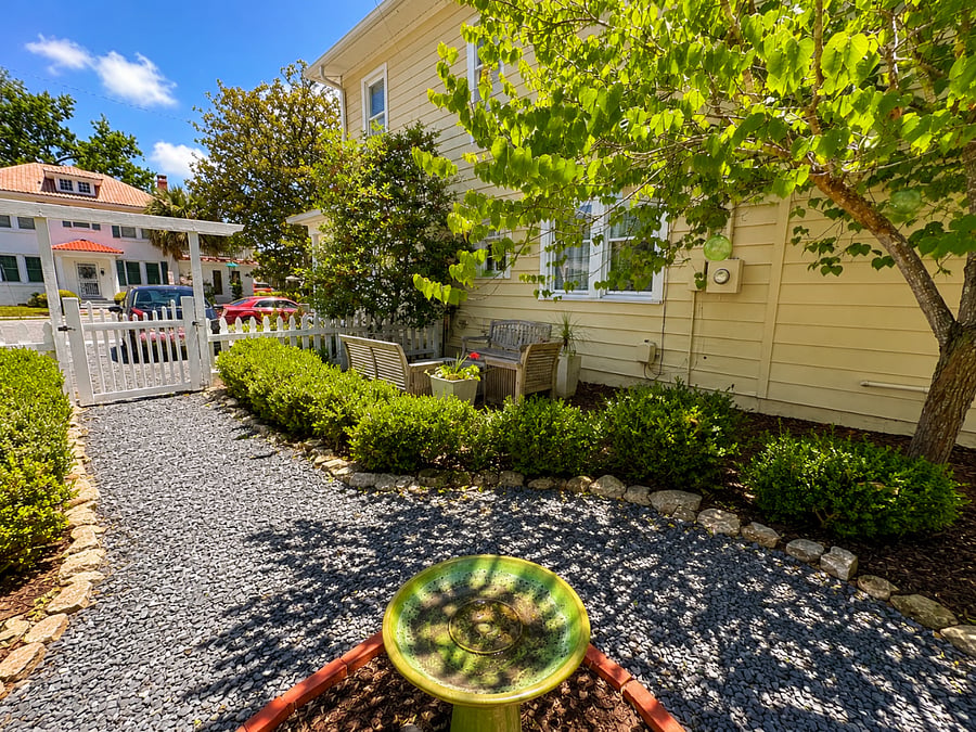Parking pad and entry from 40th Street. Walk through the main garden to the Salt House.