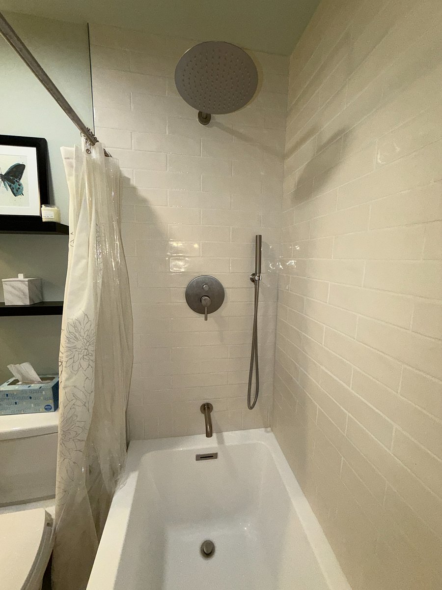 Second Bathroom with rain shower and tub.