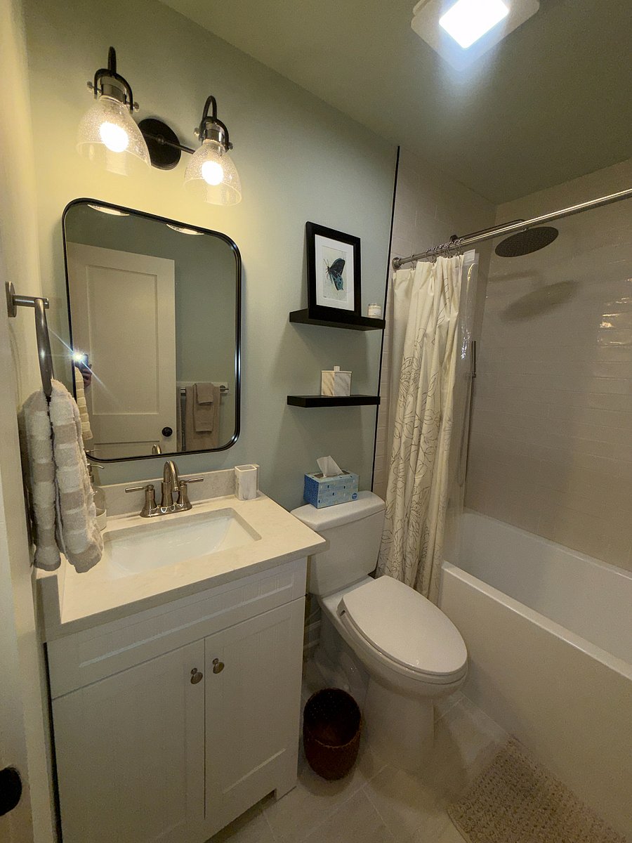 Second Bathroom with rain shower and tub.