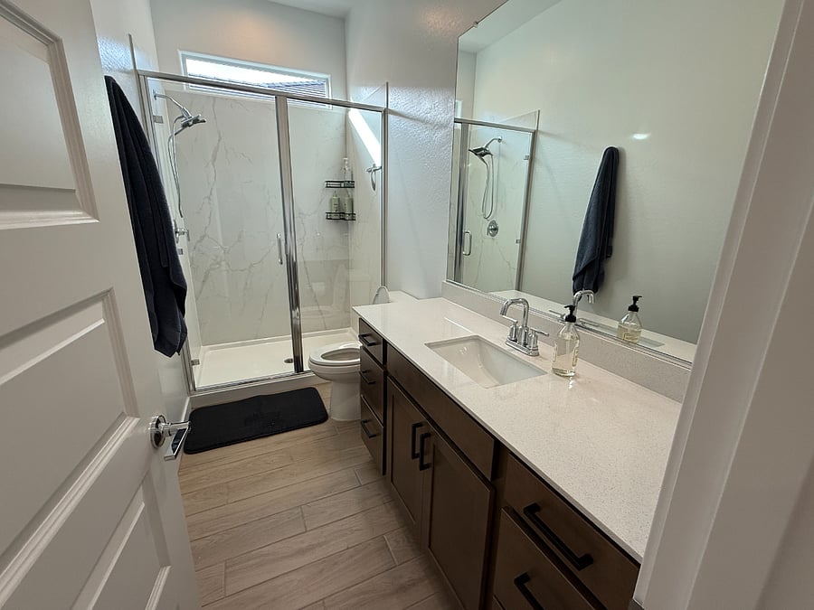 Walk-in Shower. Amazing Water Pressure and Tankless water heater so you never run out!