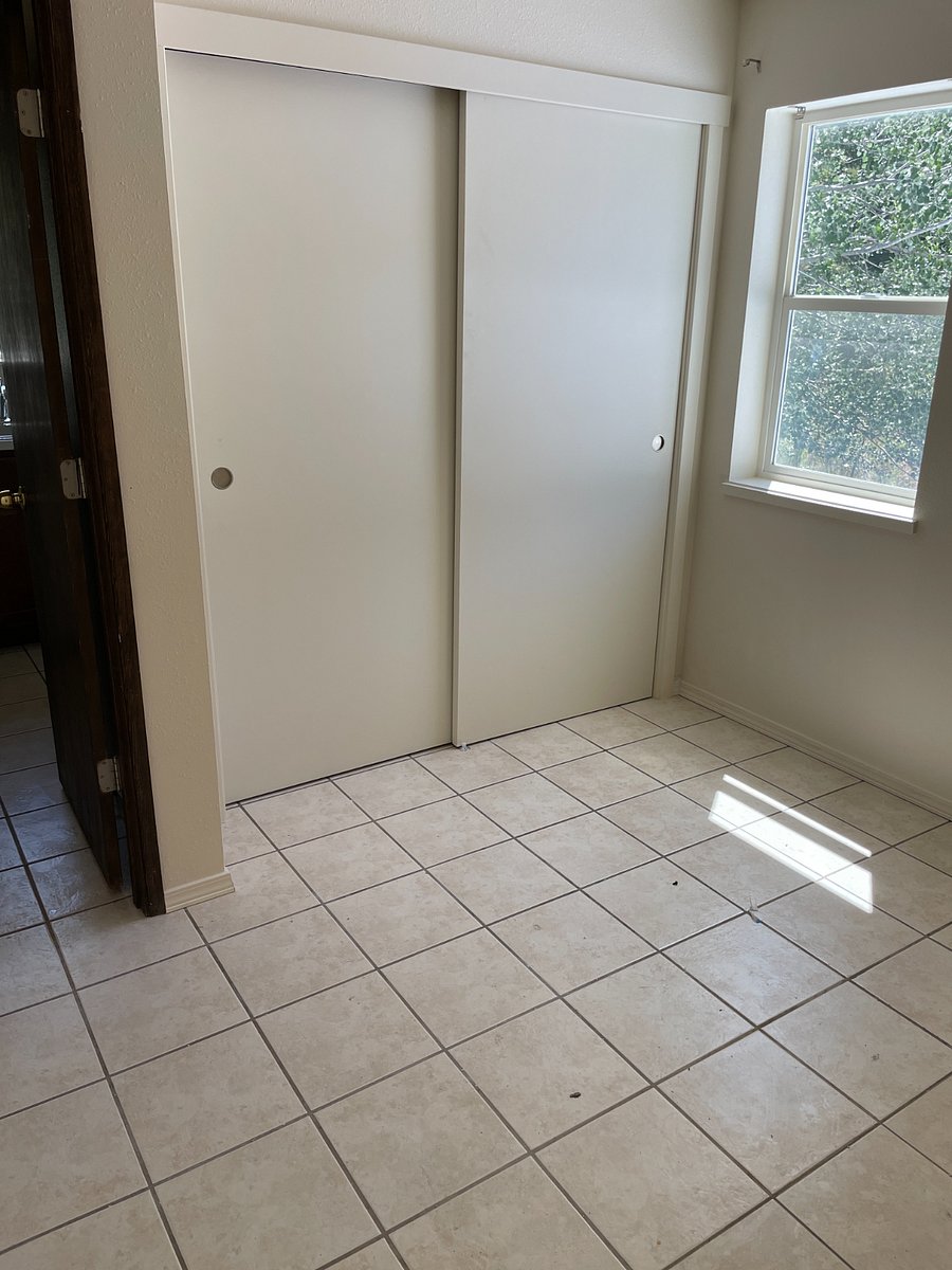 Bedroom closet and south facing window