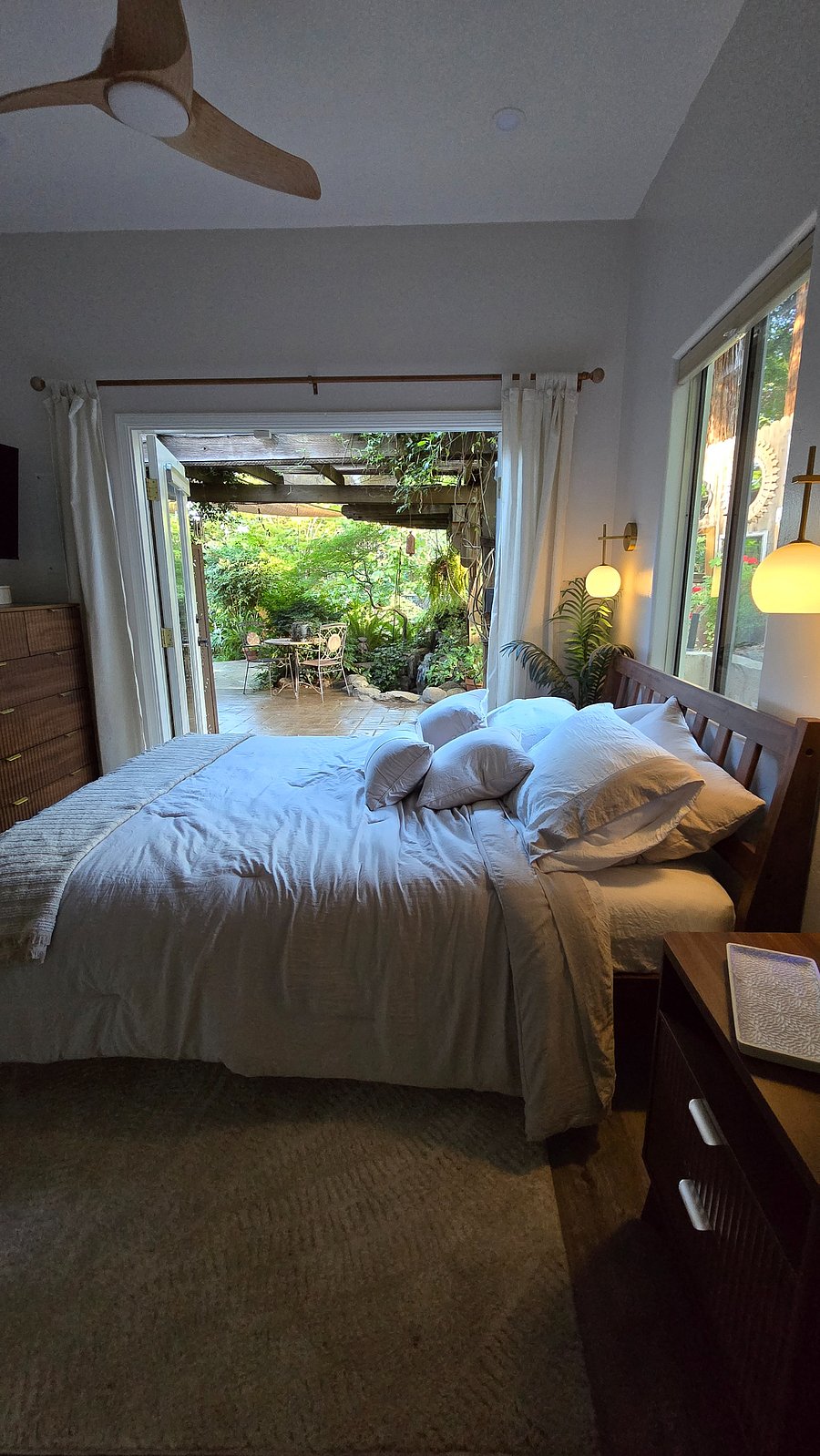 Beautiful views from the bedroom with lush plants and waterfalls