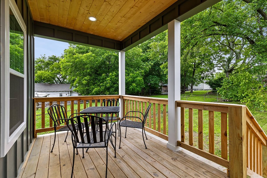 Large back deck with charcoal grill