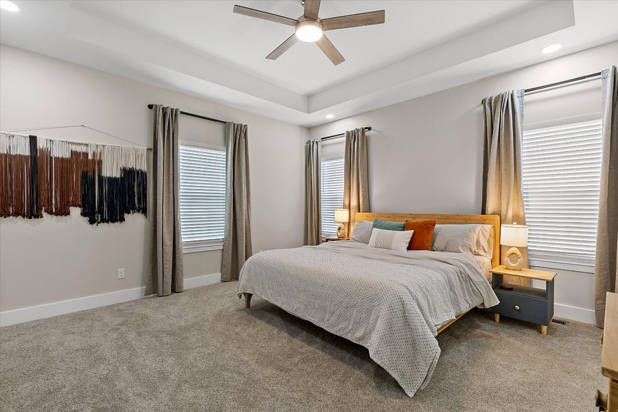 Primary bedroom with blackout curtains