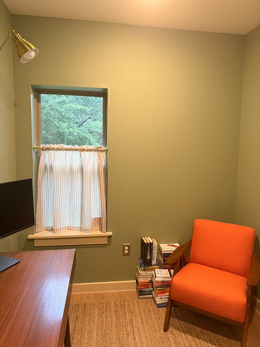 Lounge seating in office perfect for comfortable reading.