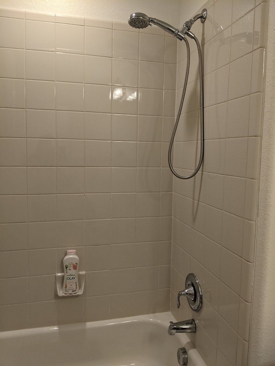 Flexible shower head that you can plug it in and out for your convenience.