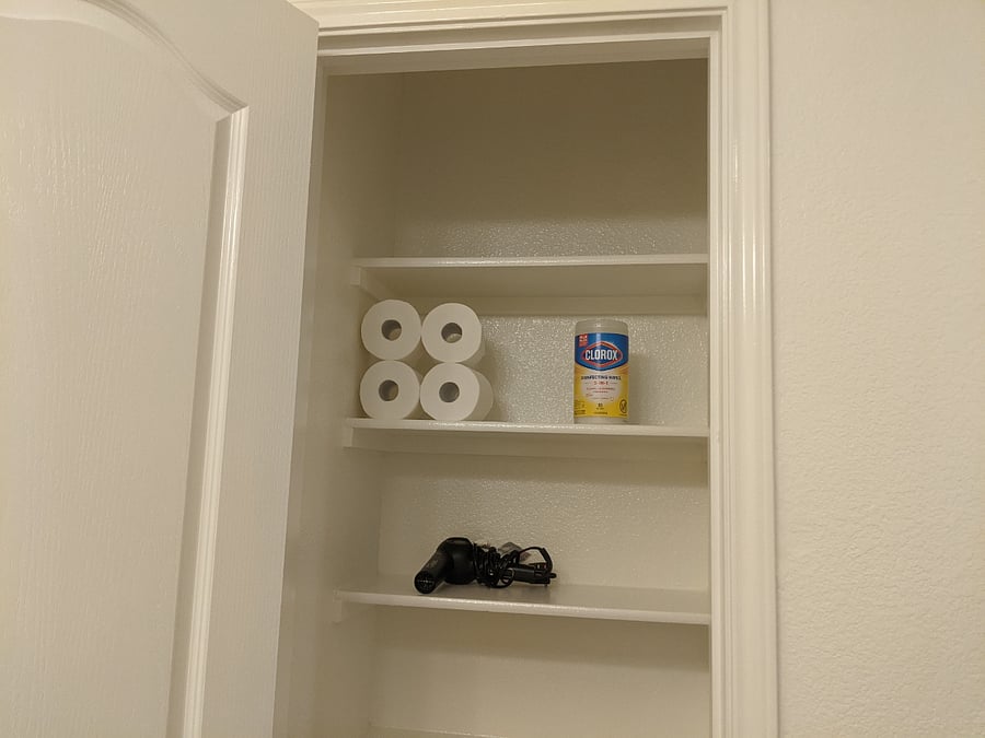 Spacious closet in bathroom making it so convenient for all kind of storage.