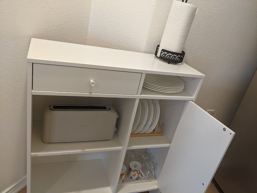 Food preparation desk. We provide kitchen towels, dinning wares, plates and bowls, cups and glass. We also provide disposable utensils if you prefer.