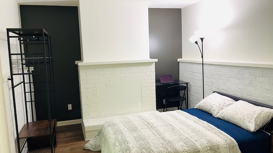 bed, closet, computer desk, and chair