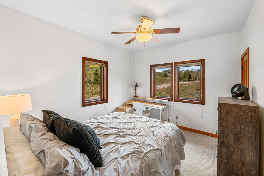 Bedroom 2 w/ queen -  work station with views of Mt. Crested Butte