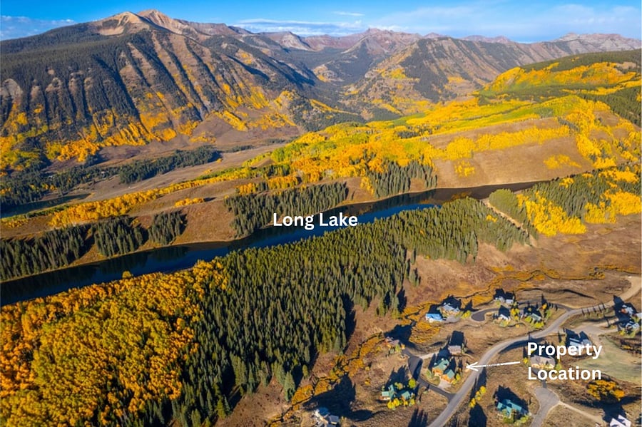 Long Lake is right on top of the hillside next to the property