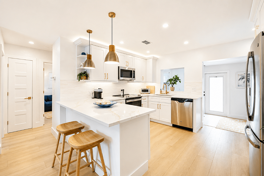 Fully renovated kitchen with quartz countertops and everything you needfrom quick breakfasts before an early shift to home-cooked dinners.