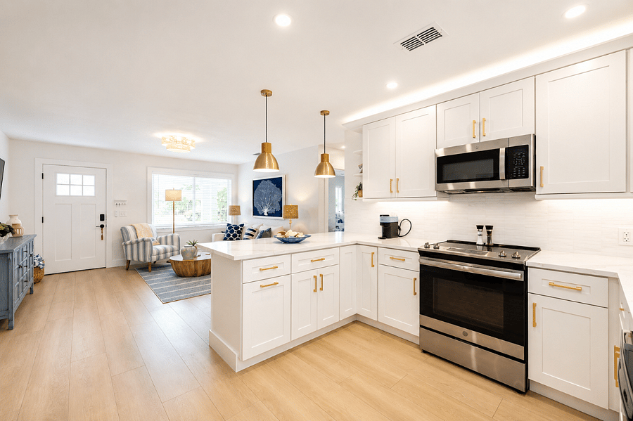 Large kitchen with quartz counters, breakfast bar, coffee station and everything you need to create dazzling dinners, or grab something quick on the go