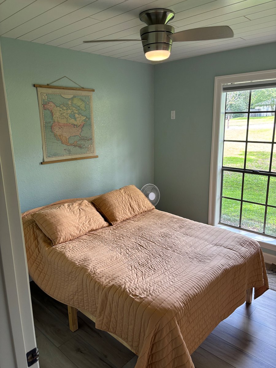 Full size memory foam bed with ceiling fan in bedroom 3.