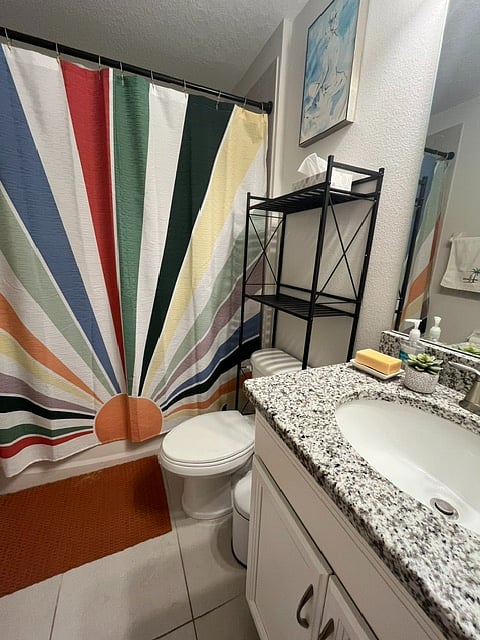 Private bathroom with tub and shower