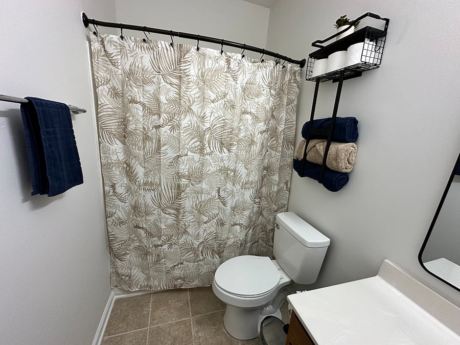 Private bathroom inside the primary bedroom area.