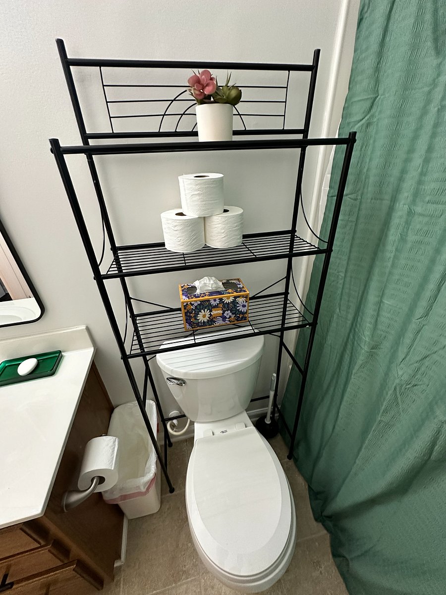 Fully stocked secondary bathroom.