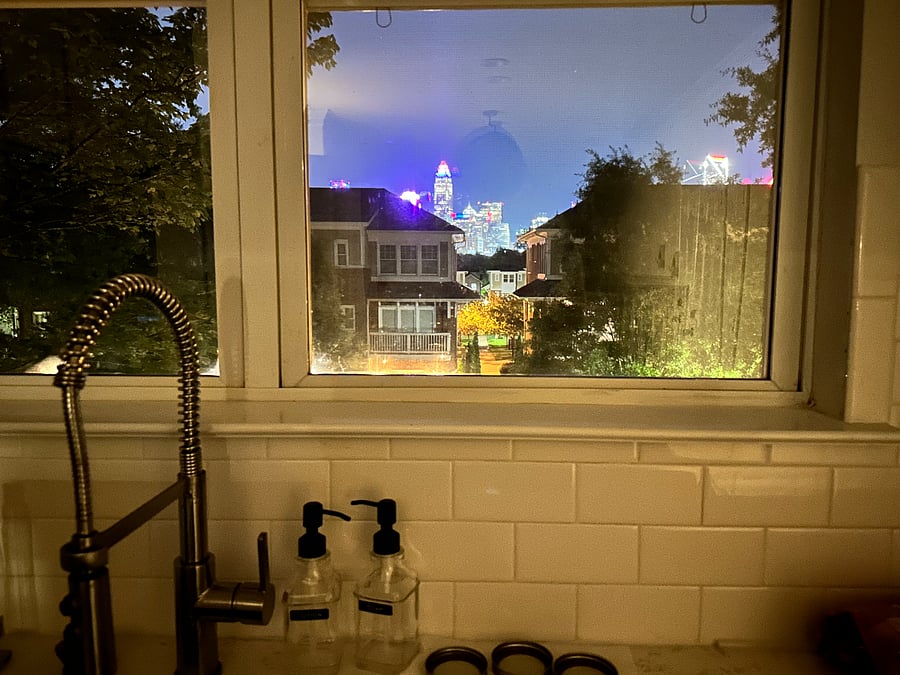 Gorgeous view of the city from the kitchen area at night (view from kitchen sink).