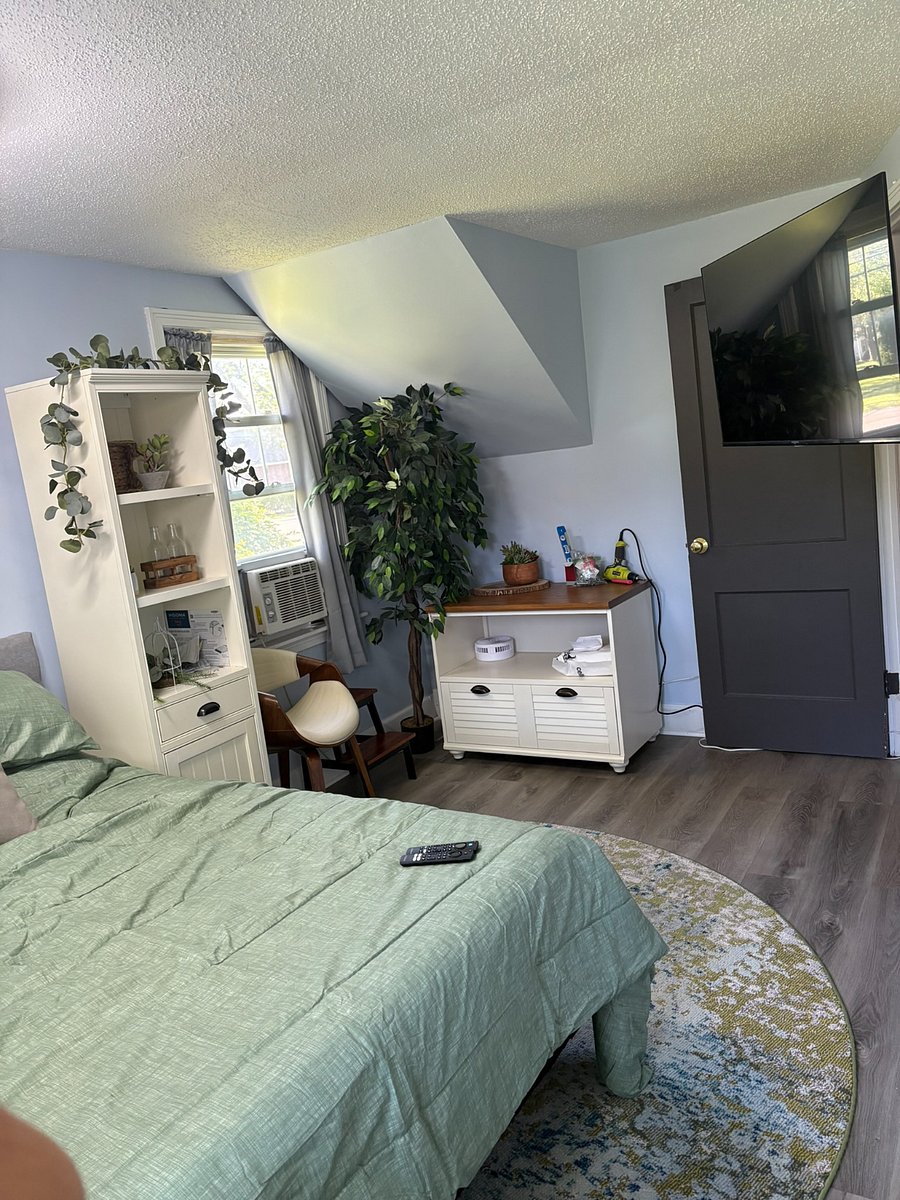 first floor bedroom 1; full bed with big screen Smart TV (Netflix provided; all other apps available for login)