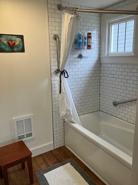 Shower and tub with grab bars for safety