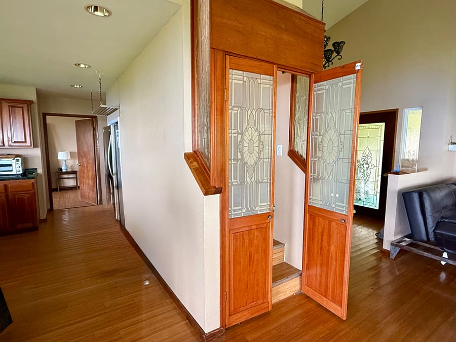 Private door to upstairs primary suite/floor