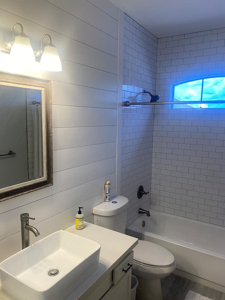 Upstairs hallway full bathroom located next to bedroom 2 and down hall from bedroom 3.