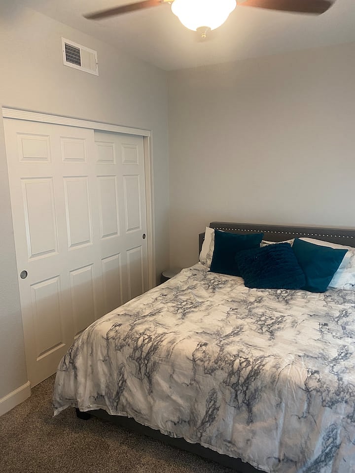 Main level bedroom with king bed.
