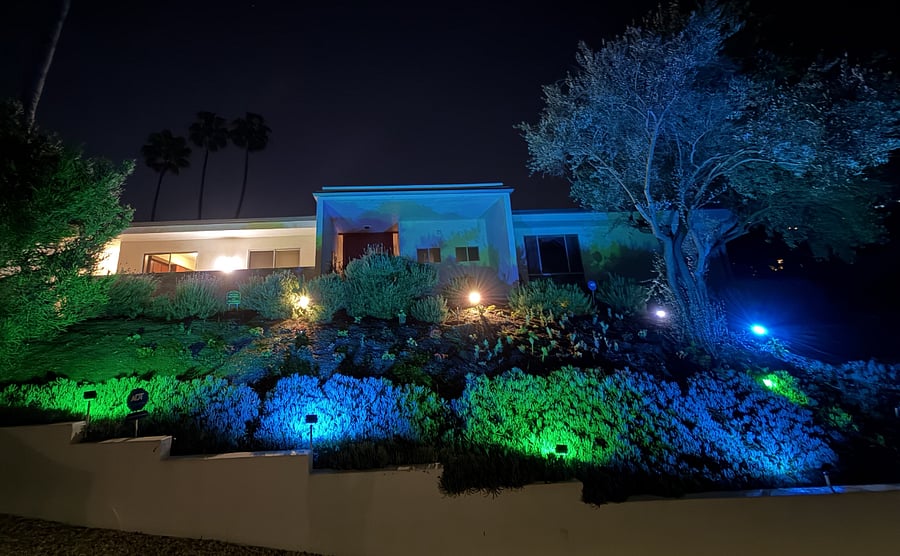 Remote controlled digital lighting, fountain at front door.