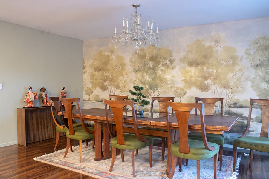 Mid century modern dining set in walnut, originally from Rapport. Matching buffet. Custom wallpaper of trees and stream. Hungarian crystal chandelier with dimmable bulbs. 