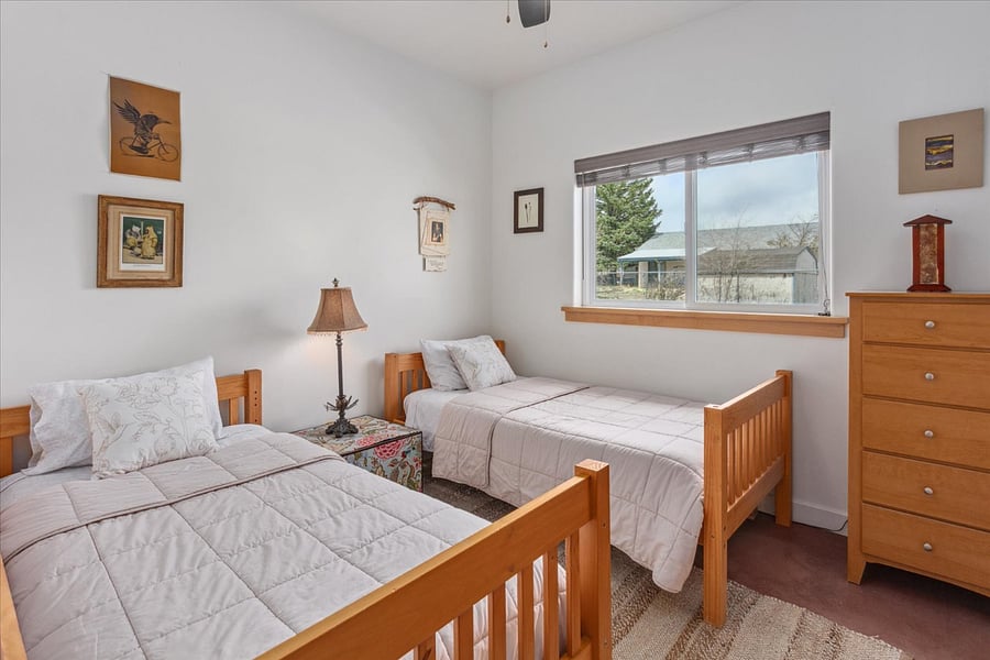 Second bedroom with two twin sized beds.