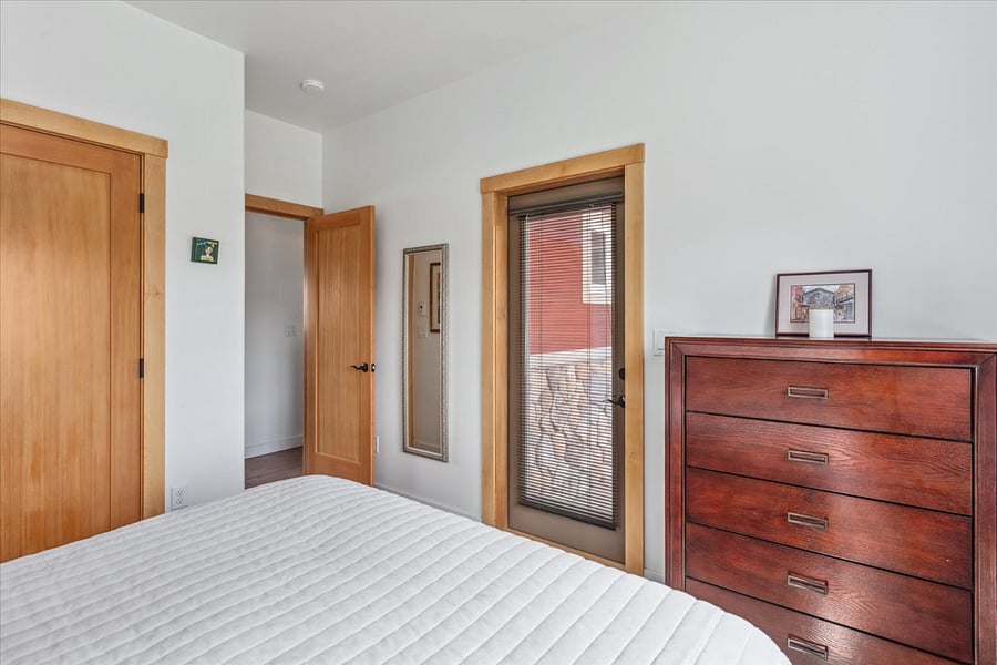 Main bedroom with patio nook access.