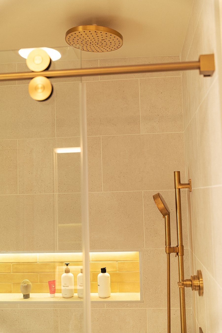 full bathroom that has a brand new installed rain shower and you can turn the hand held shower and the rain shower at the same time! we love the pressure of the water as well, it's perfect
