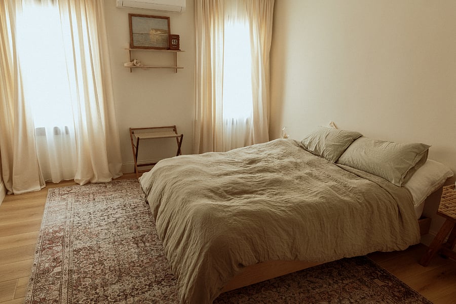 Welcome to the primary bedroom with a queen sized beddon't you just love it? With its spacious layout, cozy atmosphere, and thoughtful design, it's the perfect retreat to relax and unwind after a day of exploring.