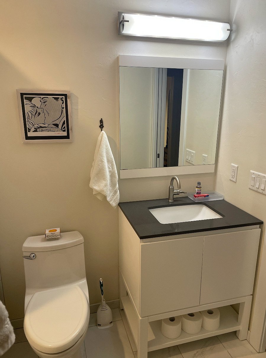 Bathroom vanity area w/ extra washstand storage
