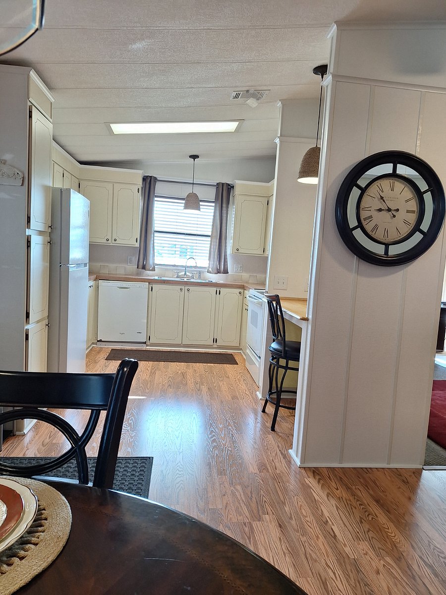 Efficient galley kitchen, lots of cabinets, with all kitchen essentials.